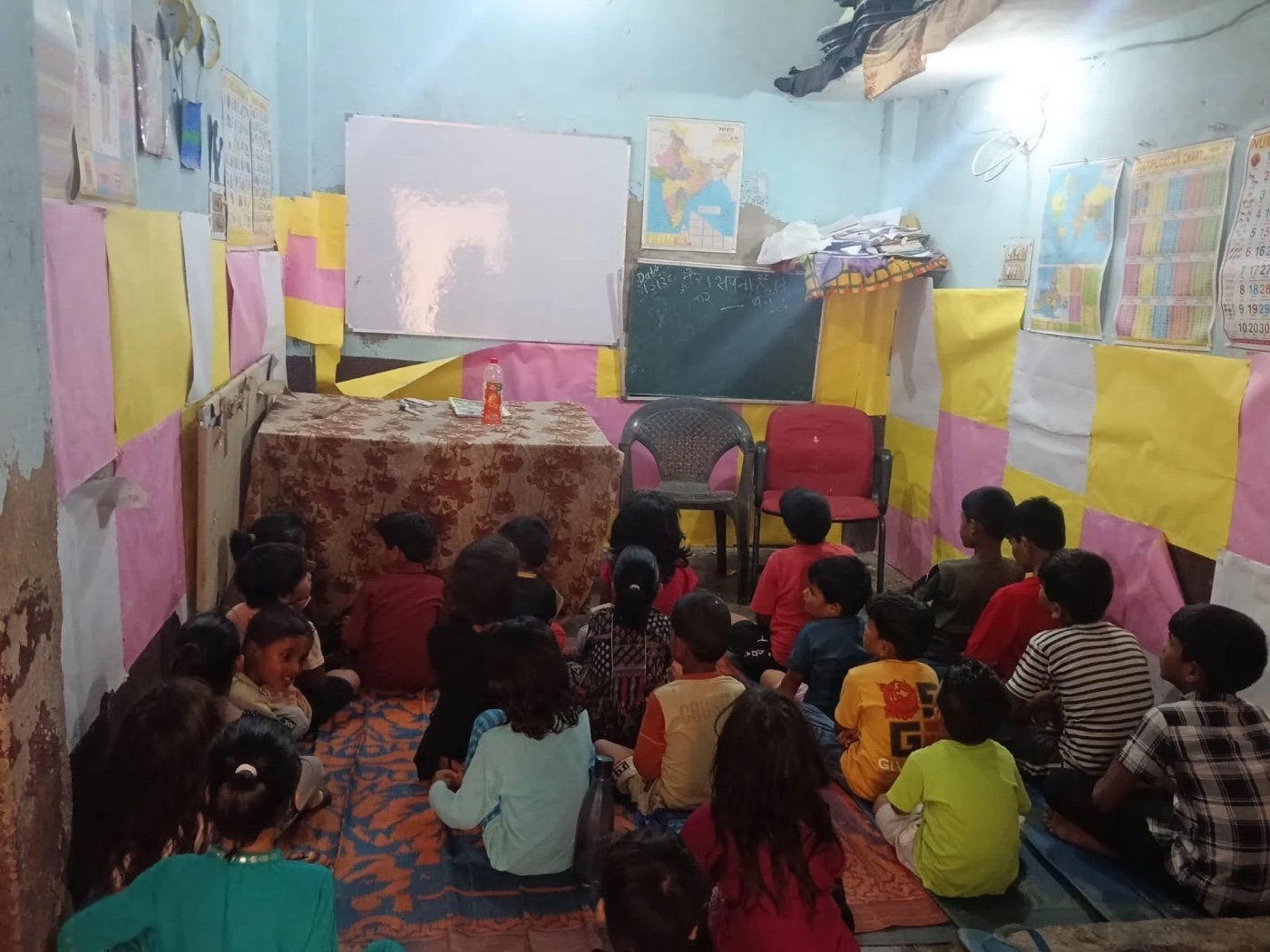 Children learning at an Aadi Foundation centre